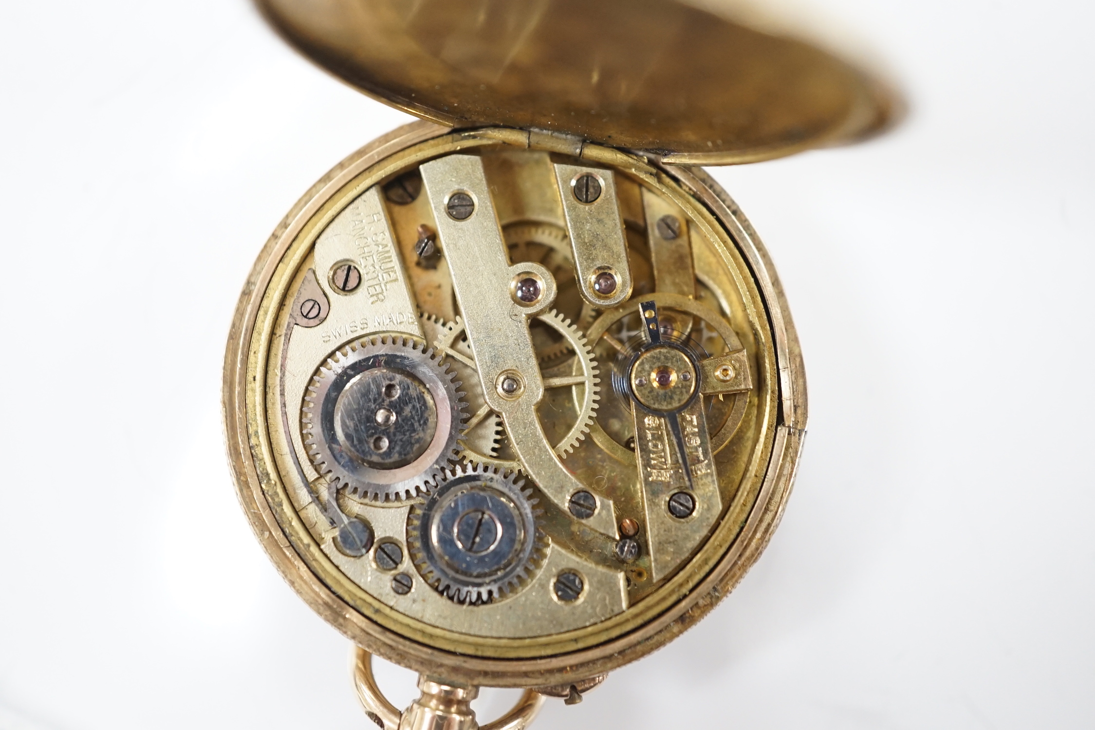 A Swiss 9ct gold open face fob watch, with Roman dial, glass loose, gross weight 26.3 grams.